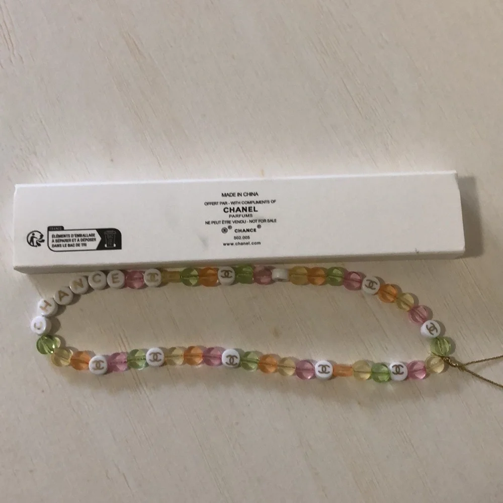 Chanel Chance phone charm